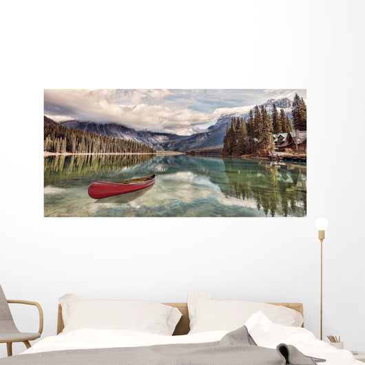 Red canoe on Emerald Lake Wall Mural