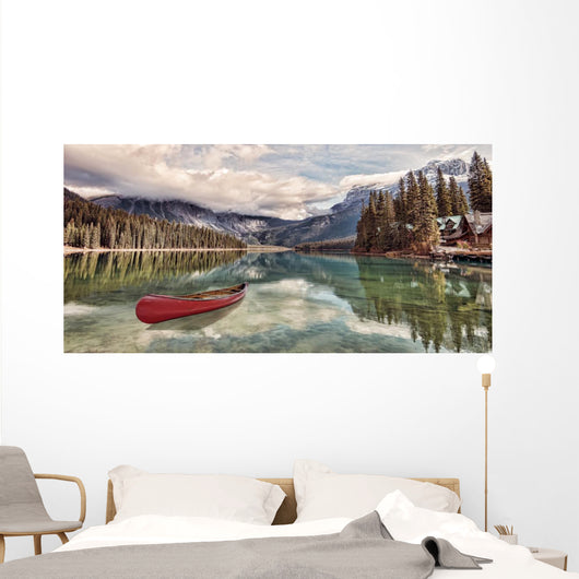 Red canoe on Emerald Lake Wall Mural