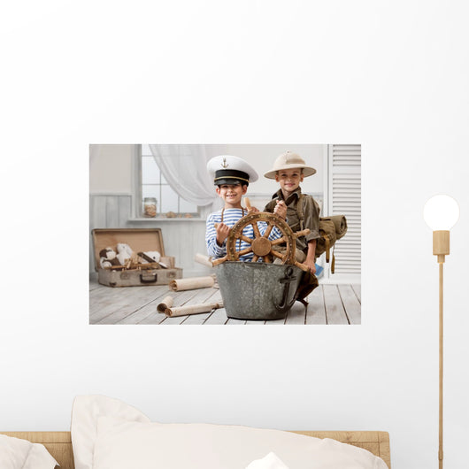 Boys playing captain and traveler Wall Mural
