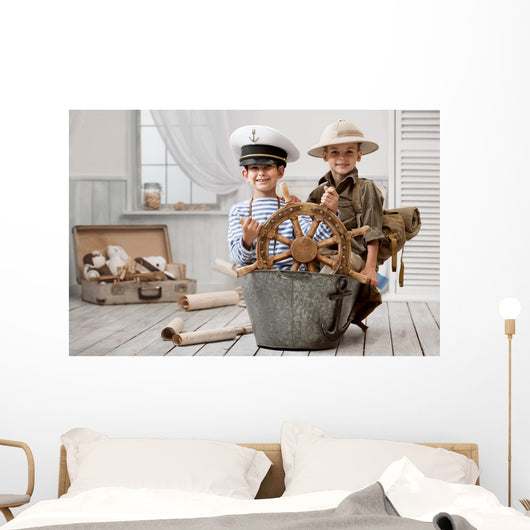 Boys playing captain and traveler Wall Mural