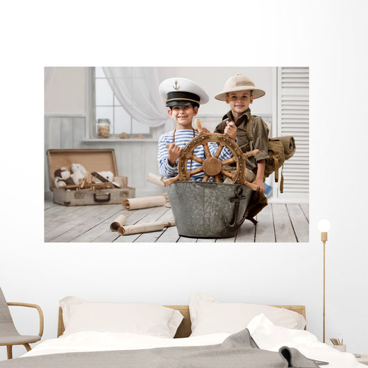 Boys playing captain and traveler Wall Mural