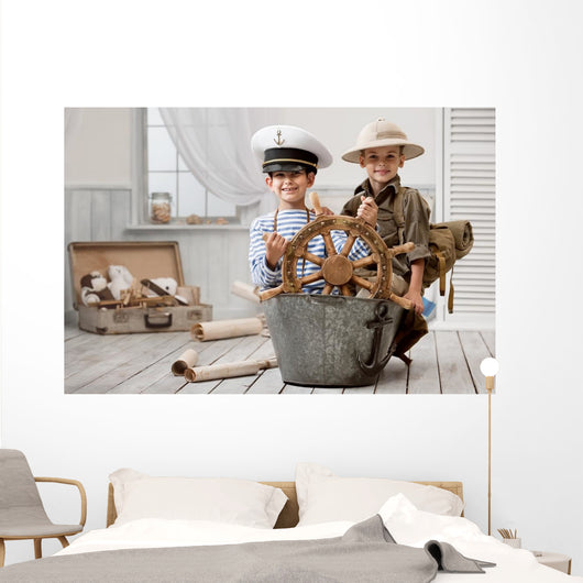 Boys playing captain and traveler Wall Mural