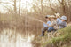 Boys fishing on the lake Wall Mural