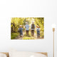 Boys go fishing with fishing rods on a rural street Wall Mural