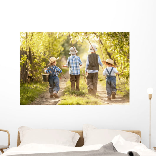 Boys go fishing with fishing rods on a rural street Wall Mural