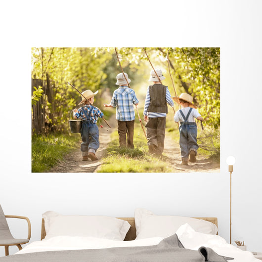 Boys go fishing with fishing rods on a rural street Wall Mural
