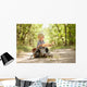 Boy traveler exploring route map Wall Mural