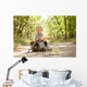Boy traveler exploring route map Wall Mural