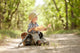 Boy traveler exploring route map Wall Mural