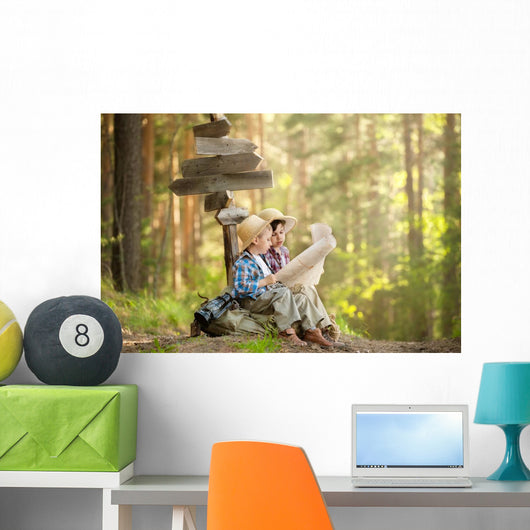 Boys on a forest road with backpacks Wall Mural
