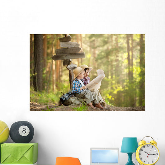 Boys on a forest road with backpacks Wall Mural