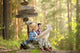 Boys on a forest road with backpacks Wall Mural