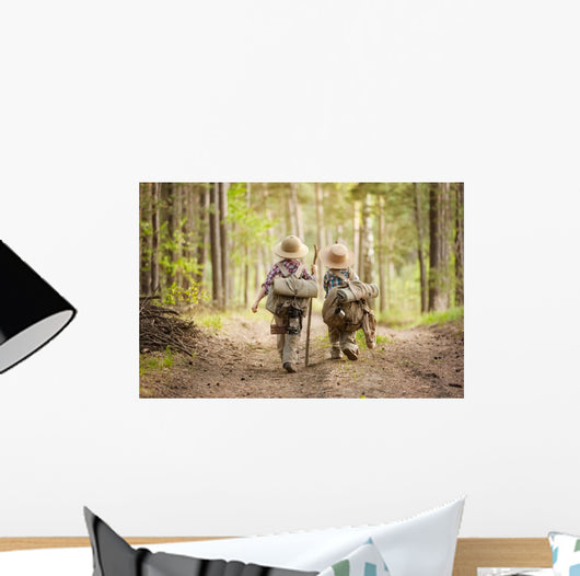 Boys on a forest road with backpacks Wall Mural