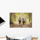 Boys on a forest road with backpacks Wall Mural