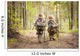 Boys on a forest road with backpacks Wall Mural