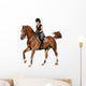 Brunette woman cantering on chestnut horse isolated on white Wall Decal