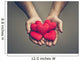 old hands of the elderly giving a red heart Wall Mural