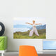 Senior woman doing yoga exercises Wall Mural