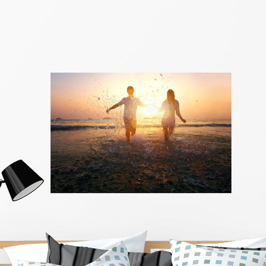 happy family on the beach Wall Mural