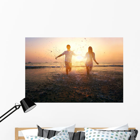 happy family on the beach Wall Mural