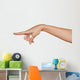 beautiful woman hand pointing a finger in the blank Wall Decal