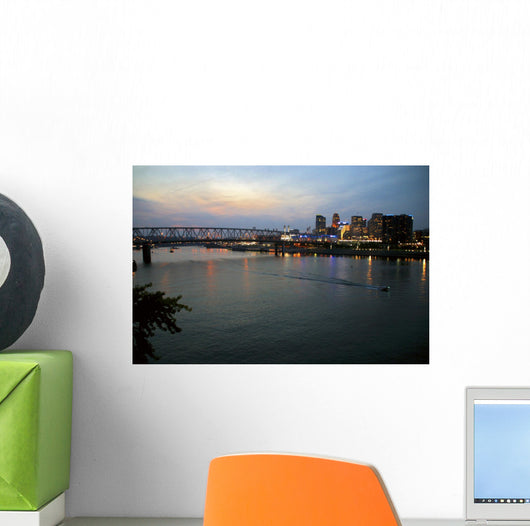 Cincinnati skyline from Newport, KY with riverboat at night. Wall Mural
