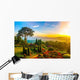 Beautiful garden of colorful flowers on hill with sunrise in the Wall Mural
