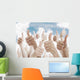 Many people holding their thumbs up Wall Mural