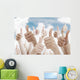 Many people holding their thumbs up Wall Mural