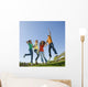 Happy teens jump in air. Wall Mural