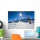 Skis in snow at Mountains Wall Mural