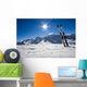 Skis in snow at Mountains Wall Mural