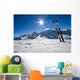 Skis in snow at Mountains Wall Mural
