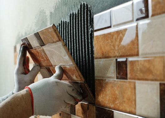 Laying Ceramic Tiles. Wall Mural