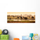 Herd of elephants in African delta Wall Mural
