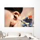 The chipping hammer in the ear Wall Mural