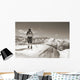 Sepia Vintage skier with wooden skis Wall Mural