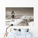 Sepia Vintage skier with wooden skis Wall Mural