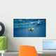 Underwater portrait of a woman snorkeling Wall Mural