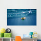 Underwater portrait of a woman snorkeling Wall Mural
