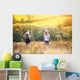 Family enjoying life together outside Wall Mural