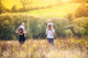 Family enjoying life together outside Wall Mural