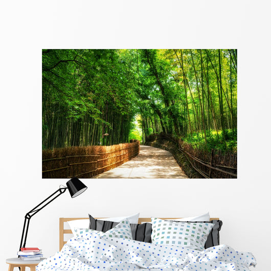 A small road through the bamboo forest. Wall Mural