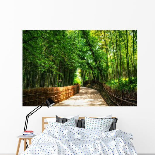 A small road through the bamboo forest. Wall Mural