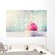 Delicious birthday cupcake on wooden table Wall Mural