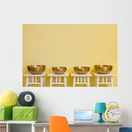 row of therapeutic Tibetan singing bowls Wall Mural