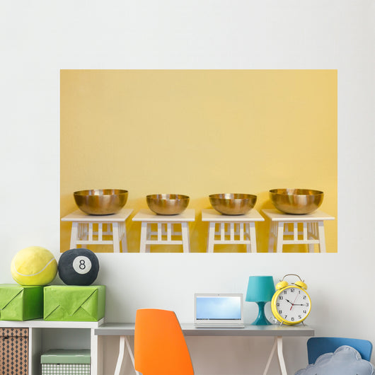 row of therapeutic Tibetan singing bowls Wall Mural