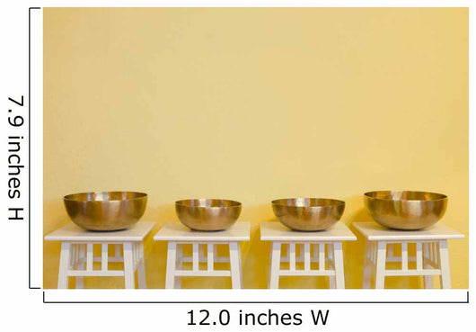 row of therapeutic Tibetan singing bowls Wall Mural