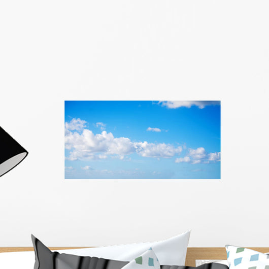 white clouds in the blue sky Wall Mural