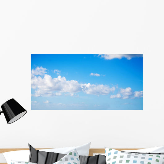 white clouds in the blue sky Wall Mural